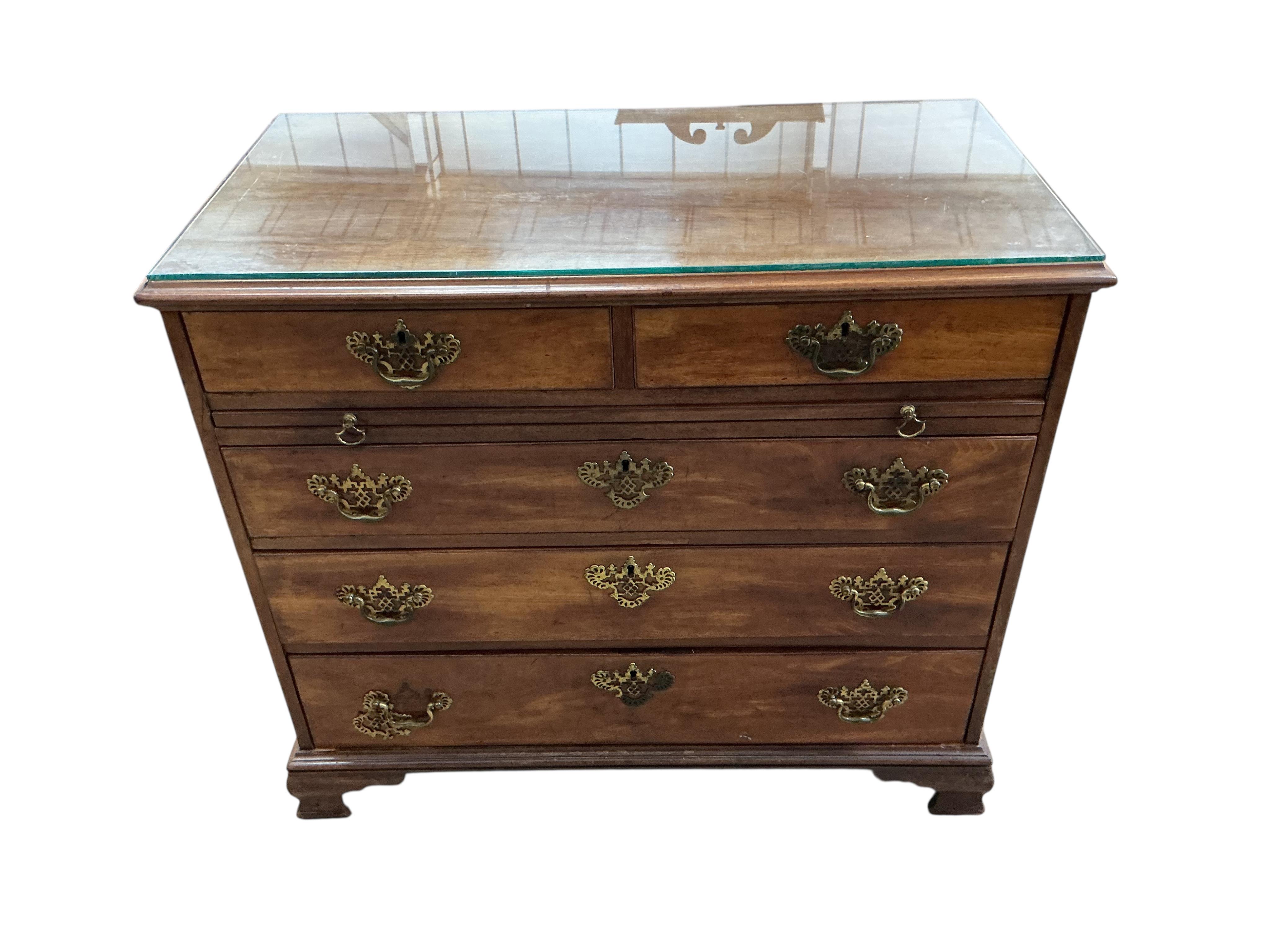 A George III mahogany chest with brushing slide, width 97cm, depth 50cm, height 86cm